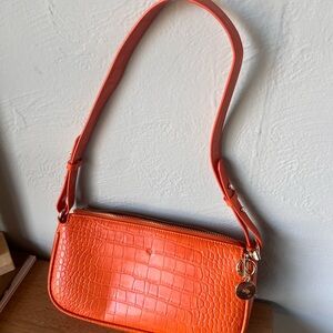 Vibrant Orange Leather Shoulder Bag with Gold Hardware